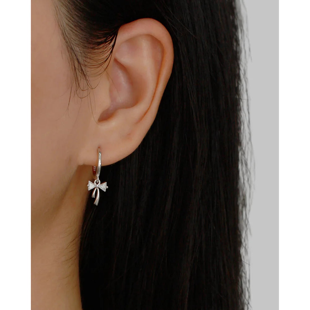 BOW HUGGIE EARRINGS