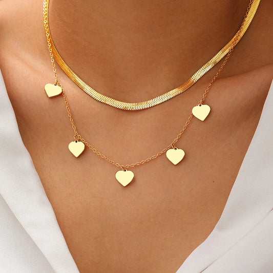 SNAKE BONE HEART NECKLACE