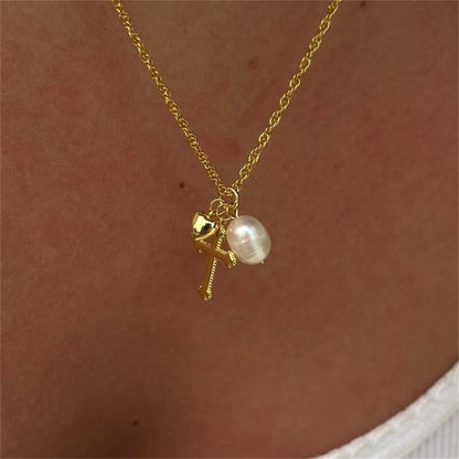 NATURAL CROSS PEARL NECKLACE
